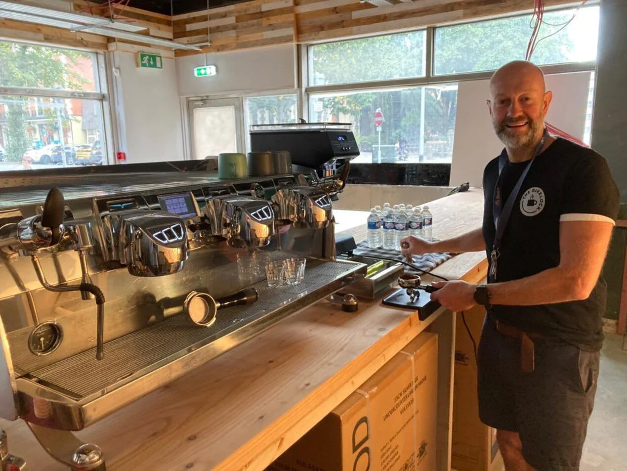 Bikelock cafe owner Tom Overton with a new coffee machine